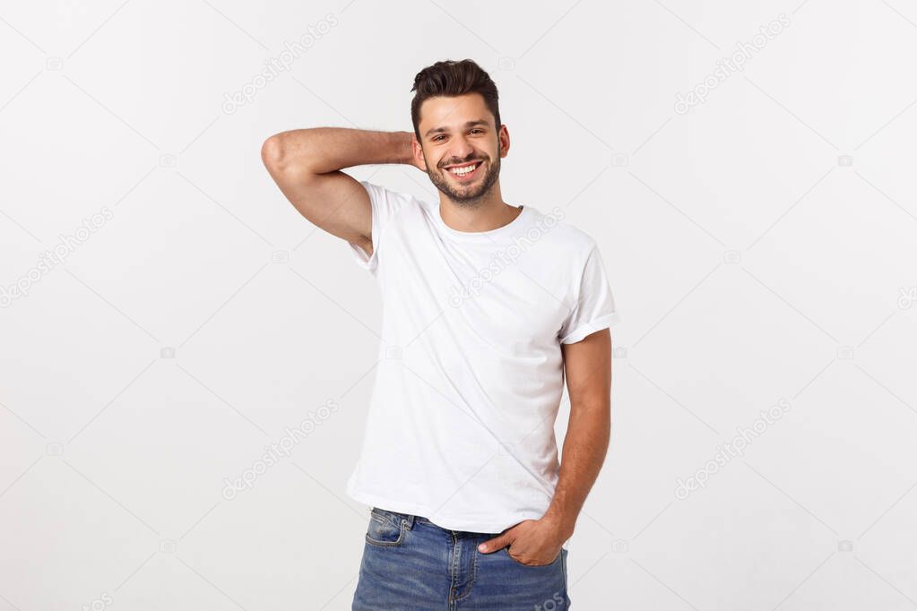Portrait of a handsome young man smiling against white background