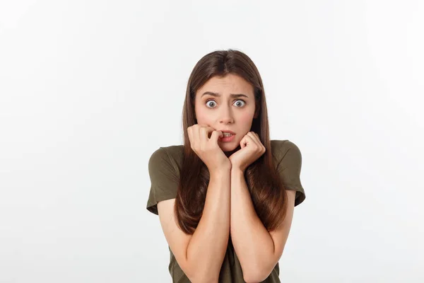 Close-up portrait of surprised beautiful girl holding her head in amazement and open-mouthed. Over white background — Stock Photo, Image