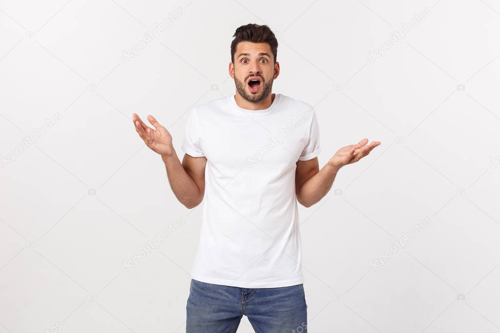 man screaming mouth open, hold head hand, wear casual white shirt, isolated white background, concept face emotion
