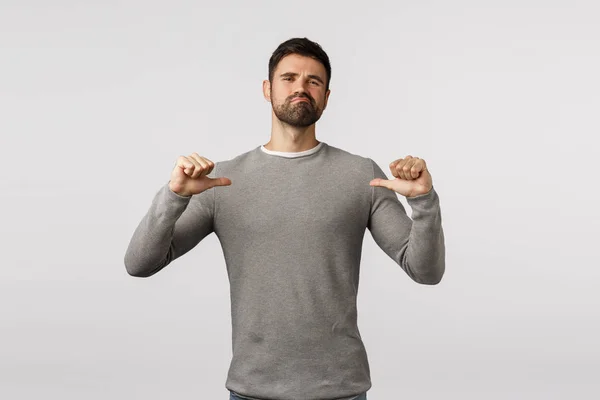I can handle it. Macho man serious-looking confident bearded guy, pointing himself with proud, assertive and self-assured expression, smirk and looking camera determined, propose own help, bragging — Stock Photo, Image