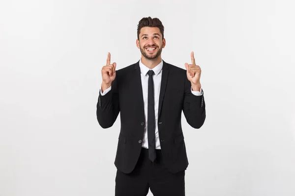 Geschäftskonzept: Portrait gutaussehender junger Geschäftsmann zeigt mit dem Finger auf leeren Kopierraum. Isoliert über weißem Hintergrund — Stockfoto