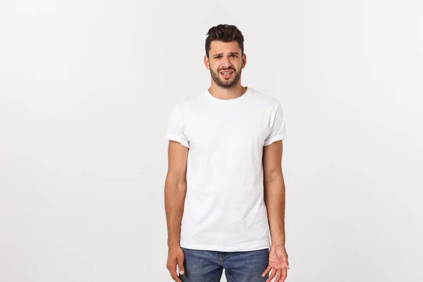 Close up portrait of disappointed stressed bearded young man in shirt over white background. — Stock Photo, Image