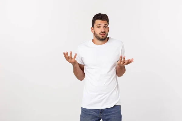 Close-up portret van teleurgesteld gestrest baard jongeman in shirt over witte achtergrond. — Stockfoto