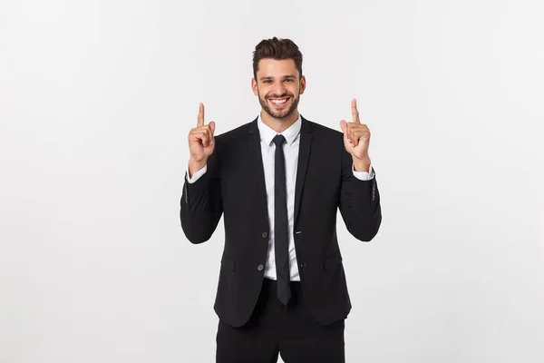 Jungunternehmer feiert seinen Erfolg über grauen Hintergrund. — Stockfoto