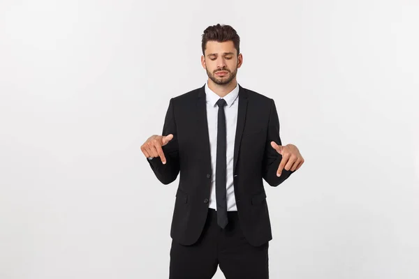 Geschäftskonzept: Portrait gutaussehender junger Geschäftsmann zeigt mit dem Finger auf leeren Kopierraum. Isoliert über weißem Hintergrund — Stockfoto