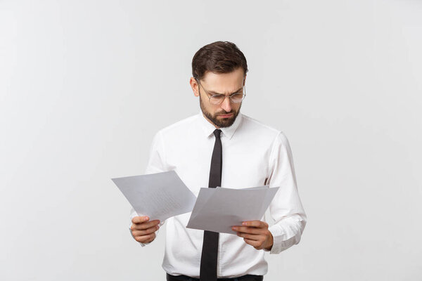 young business man serious writing on clipboard, Handsome businessman wear elegant suit and tie isolated over white background.