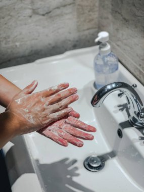 Coronavirus veya Covid-19. Corona virüsünün önlenmesi için sabuncuyla el yıkama, Coronavirus yaymayı durdurmak için hijyen..
