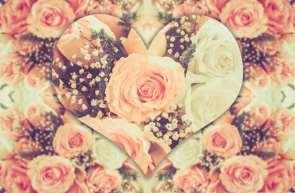Růžové růže se srdcem tvar dobře používat jako svatební nebo valentýnské pozadí — Stock fotografie