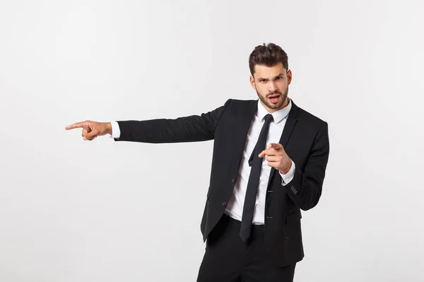 Porträt Geschäftsmann wütend und zeigt mit dem Finger auf Sie über isolierten weißen Hintergrund — Stockfoto