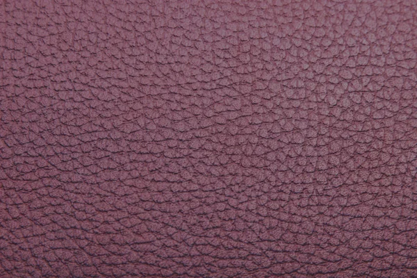 Red textured faux leather background — Stock Photo, Image