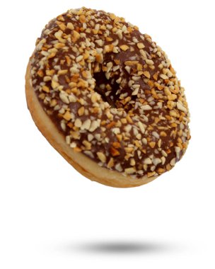 Çikolatalı donutlu tatlı ve fındıklı beyaz arka plan