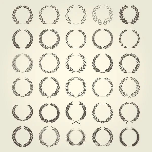 Collection de couronnes Laurel dans un style différent — Image vectorielle