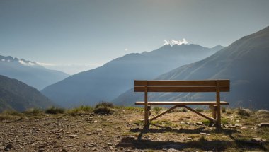 wooden bench in front of amazing view on valley and mountains (P clipart