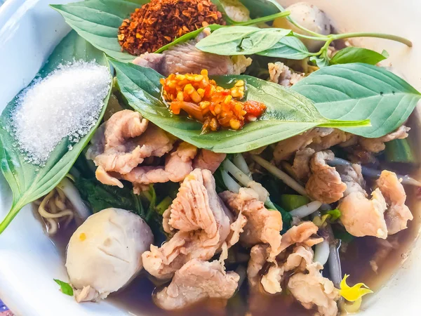 Popular street food in Thailand, Spicy pork noodle — Stock Photo, Image