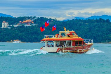 Güzel manzara göl güneş ay sabah ile mavi arka plan güneş ay Gölü Yuchi İlçesi, Nantou County, Tayvan