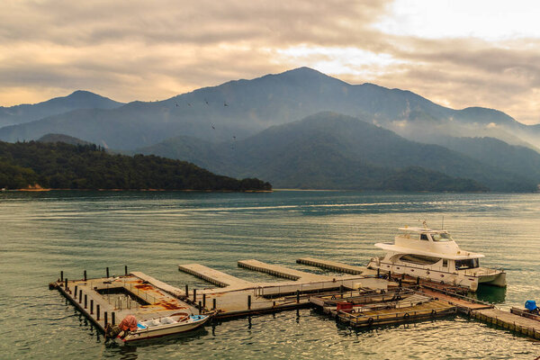 Beautiful Landscape of Sun Moon Lake in the morning with blue mountain background at Nantou, Taiwan