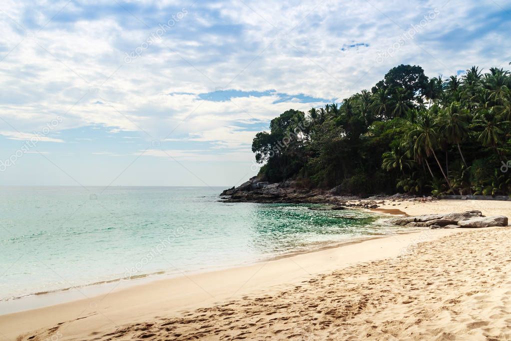 Beautiful sand, sea and sun at Naitorn beach, or Nai Thon beach, or Naithon beach (diferent to writen but same sound of speaking) Phuket, Thailand. Naithon Beach is one of these little known beaches on the west coast of Phuket, far from the crowded a
