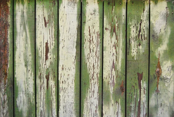 Old green wooden fence. wood palisade background. planks texture — Stock Photo, Image
