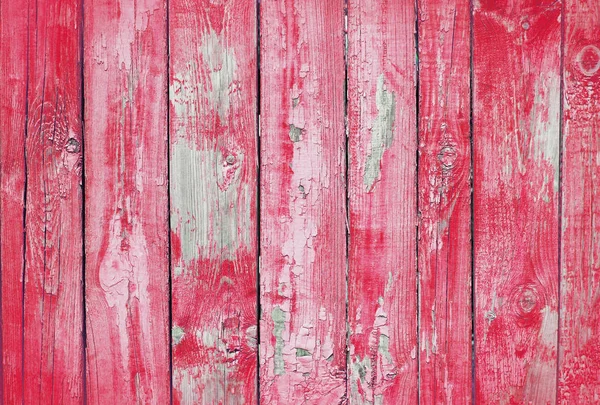 Roter alter Holzzaun. Holz Palisade Hintergrund. Textur der Bohlen — Stockfoto