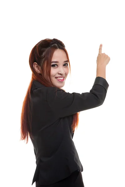 Back of Asian business woman touching the screen with her finger — Stock Photo, Image