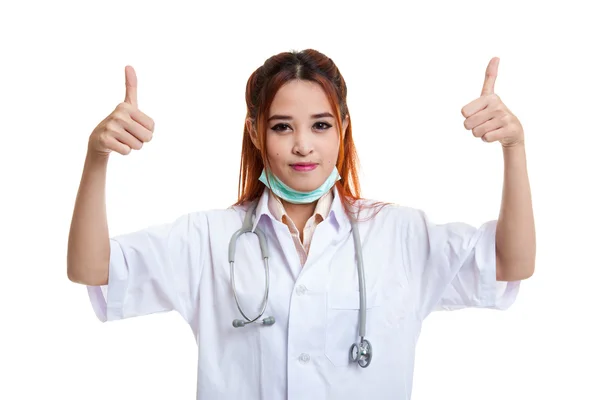 Young Asian female doctor show two thumbs up. — Stock Photo, Image