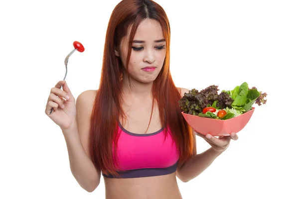 Unhappy Asian healthy girl eat salad. — Stock Photo, Image