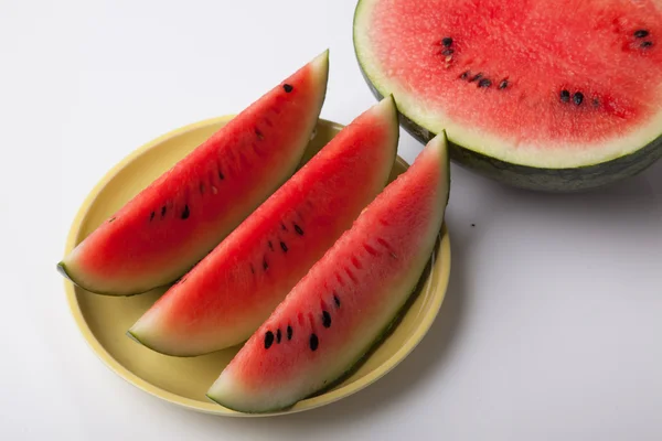 Cut watermelon on dish ready to eat — Stock Photo, Image