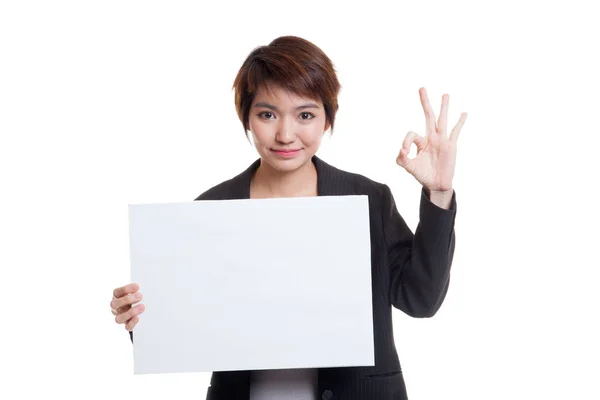 Young Asian business woman show OK with  white blank sign. — Stock Photo, Image