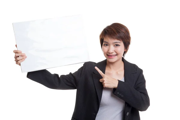 Jonge Aziatische zakelijke vrouw punt aan leeg teken. — Stockfoto