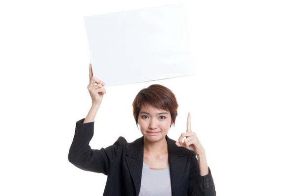 Joven asiática mujer de negocios punto a blanco signo . — Foto de Stock