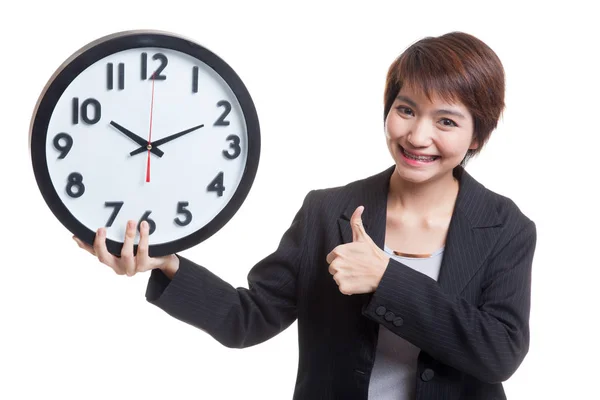 Jeune femme d'affaires asiatique pouces levés avec une horloge . — Photo