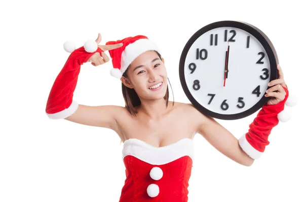 Asiatische Weihnachtsmann Mädchen zeigen auf Uhr um Mitternacht. — Stockfoto