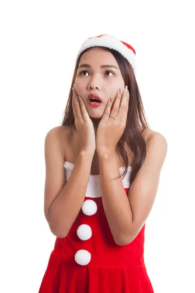 アジアのクリスマス サンタ クロース女の子ショックとルックアップ. — ストック写真