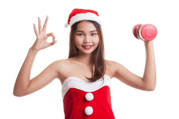 Dziewczyna azjatyckich Boże Narodzenie Santa Claus Pokaż Ok z czerwonym hantle. — Zdjęcie stockowe