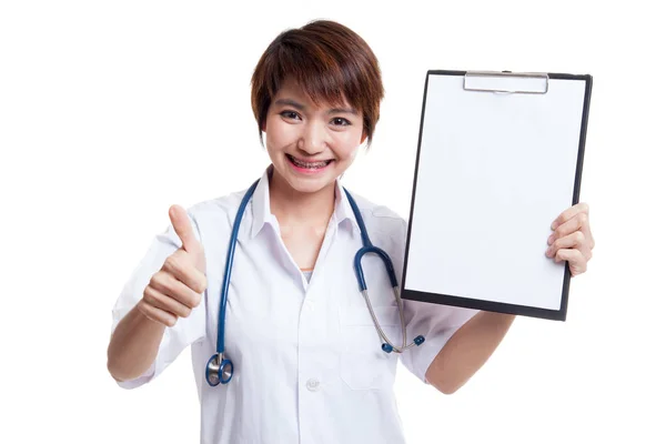 Young Asian female doctor thumbs up with a blank clipboard. — Stock Photo, Image