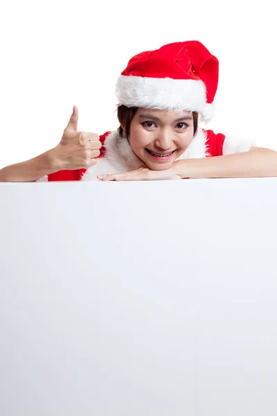 Asian Christmas Santa Claus girl thumbs up with blank sign. — Stock Photo, Image