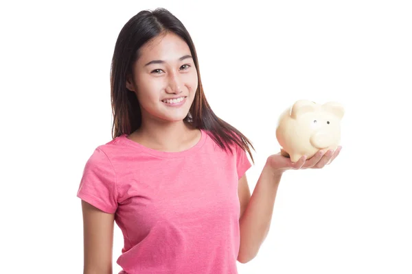 Young Asian woman with a pig coin bank. — Stock Photo, Image