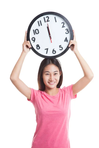 Junge asiatische Frau mit einer Uhr. — Stockfoto