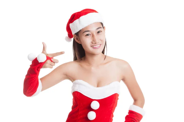 Asijské vánoční Santa Claus dívka poukazují na prázdné místo. — Stock fotografie