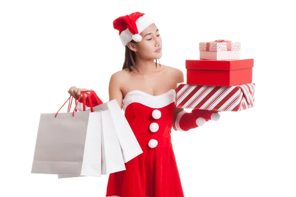 Asijské vánoční Santa Claus dívka s nákupní tašky a dárek. — Stock fotografie