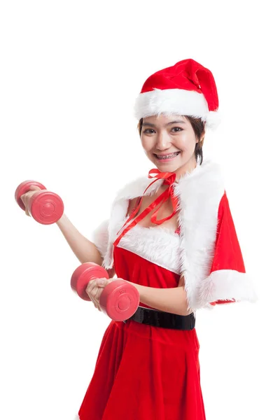 Asiatiska Christmas flicka med Santa Claus kläder och röda hantlar. — Stockfoto