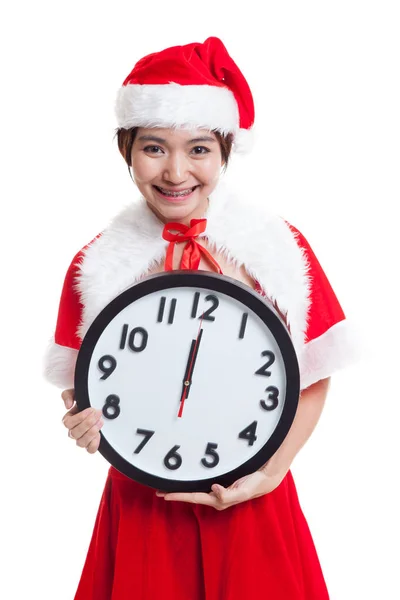 Aziatische kerst Santa Claus meisje en klok middernacht. — Stockfoto
