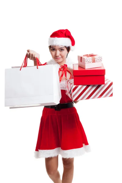 Alışveriş torbaları ve hediye ile Asya Noel Noel Baba kız. — Stok fotoğraf