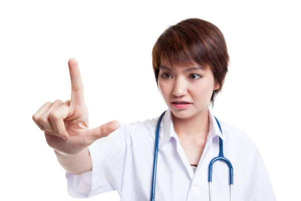 Young Asian female doctor touch a screen. — Stock Photo, Image