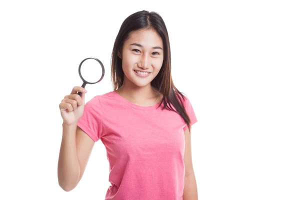 Young Asian woman with a magnifying glass. — Stock Photo, Image