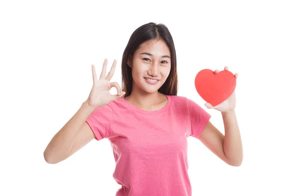 Asian woman show OK with red heart. — Stock Photo, Image