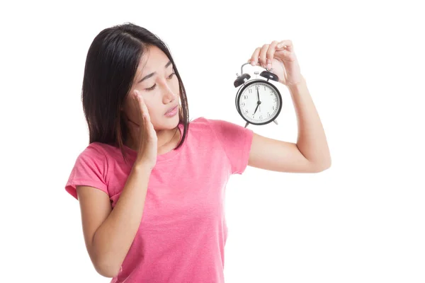 Young Asian woman is  stressed with a clock. — Stock Photo, Image