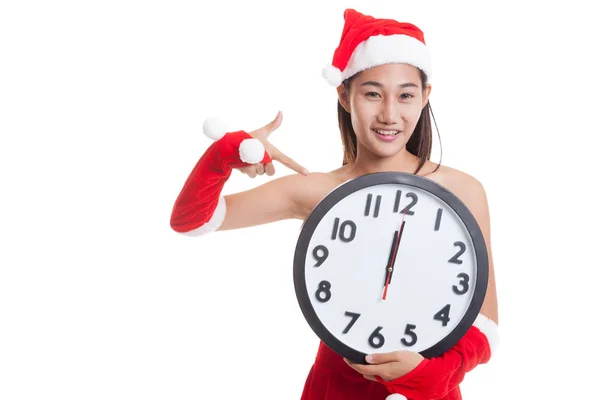 Asiatico Natale Santa Claus ragazza punto a orologio a mezzanotte . — Foto Stock