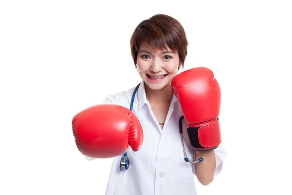 Young Asian female doctor punch with boxing glove. — Stock Photo, Image