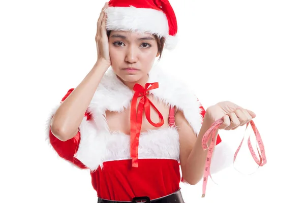 Asiática Navidad Santa Claus chica dieta con cinta métrica . —  Fotos de Stock